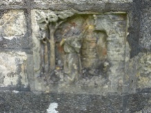 St Guron's well: the kneeling figure